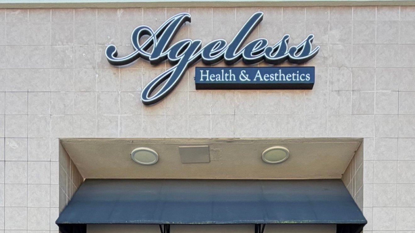 Ageless Health & Aesthetics storefront sign and entrance at the Orlando Millenia clinic